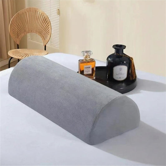 Pure Motion grey semi-roll memory foam knee pillow for back, ankle, and lumbar support.