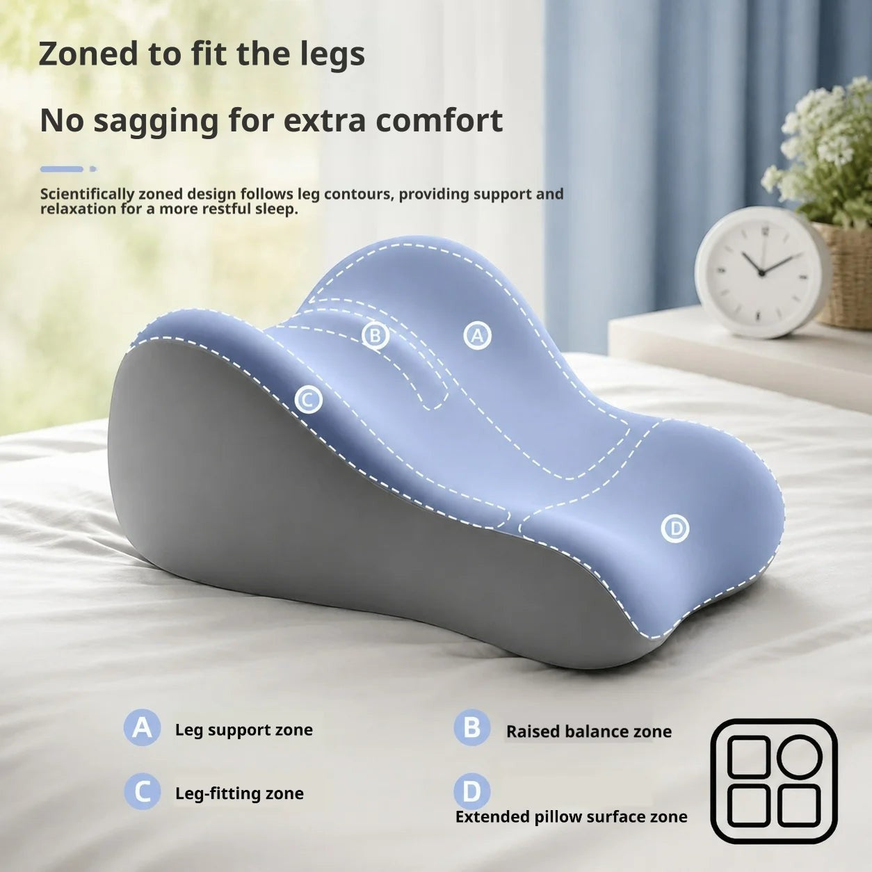 Pure Motion memory foam leg elevation pillow in sky blue and gray, featuring a contoured ergonomic design for support.