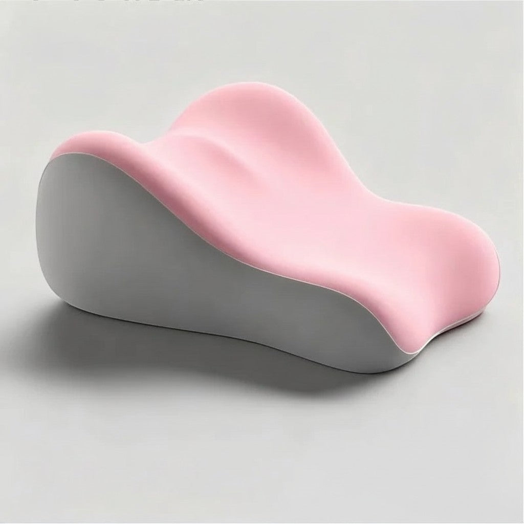 Pure Motion memory foam leg elevation pillow in pink and gray with an ergonomic contoured design for recovery.